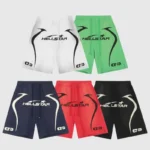 A collection of five Hellstar Warm Up Shorts in white, green, black, blue, and red, each showcasing bold Hellstar branding along with star and swoosh designs. Every pair includes a distinctive emblem on the leg.