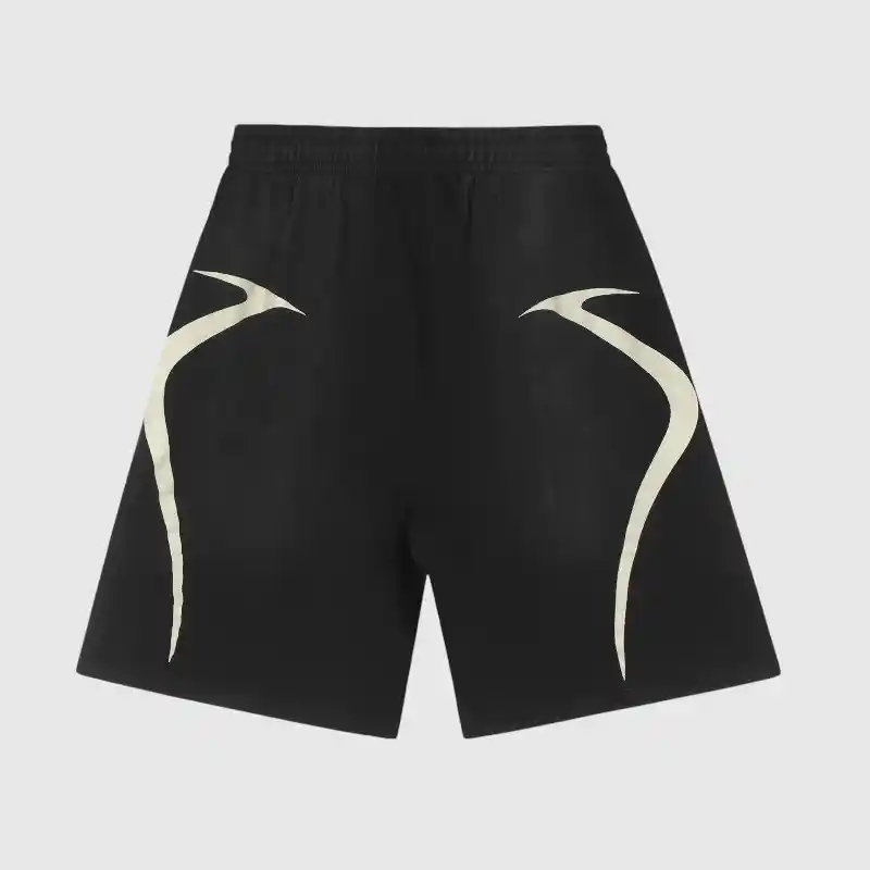 The Hellstar Warm Up Shorts 'Black' feature an elastic waistband and display a white abstract curved line design on each side, contrasting with a plain black background.